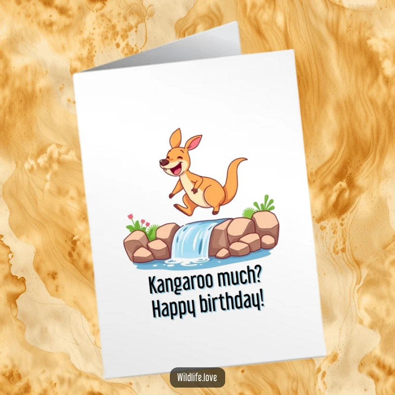 Funny Free Printable Birthday Card: Joyful kangaroo mid-air, grinning widely over a tiny waterfall, ready to deliver birthday cheer.